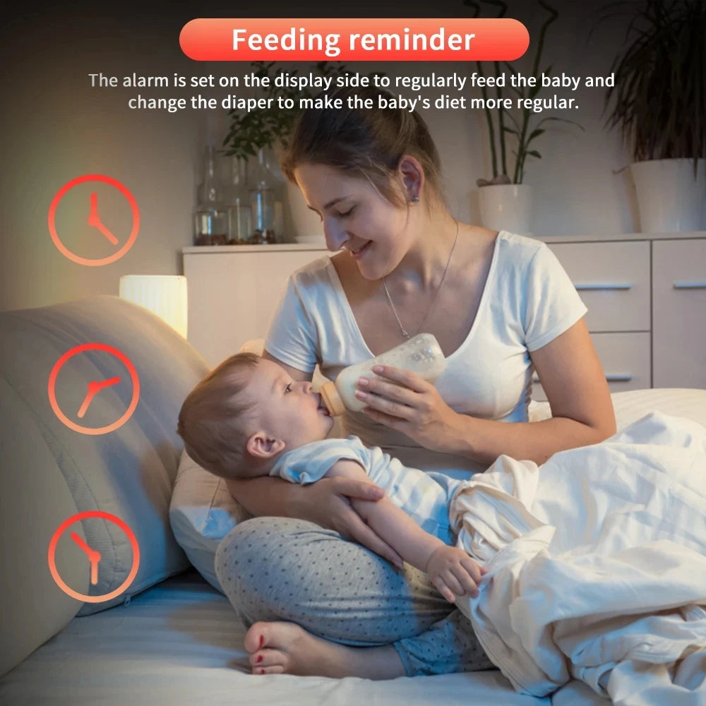 Woman feeding a baby with a bottle in a bedroom setting, featuring a feeding reminder text overlay.